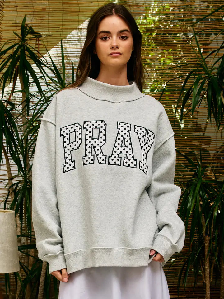 PRAY EMBROIDERED POLKA DOT MOCKNECK